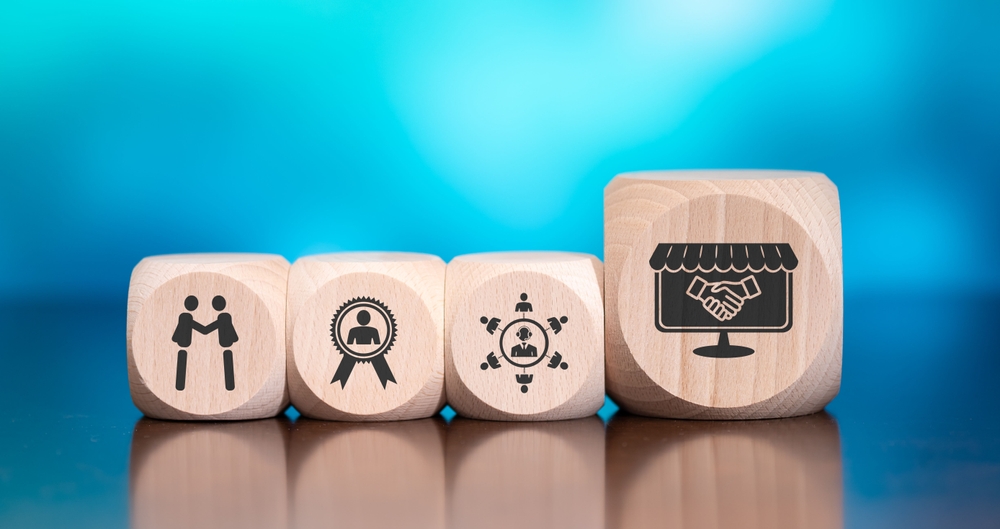 System and Staff Alignment - wooden blocks with icons