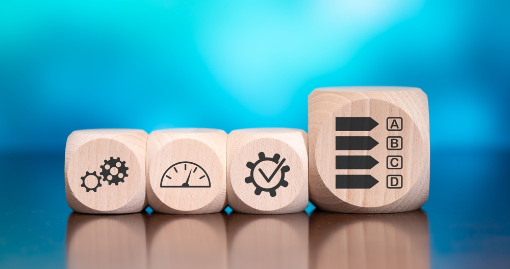 FDA Negotiation Strategies - wooden blocks with icon symbols